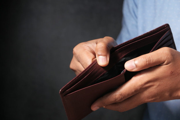 man-hand-open-empty-wallet-with-copy-space_260672-354